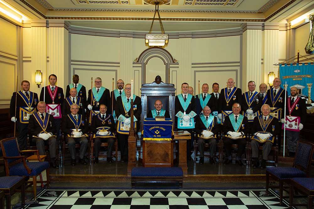Members and guests of Corinthian Lodge No. 1382 in Lodge room